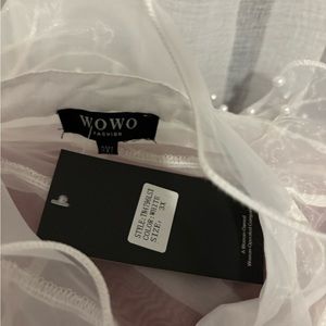 White ruffled, sheer top with pearl buttons brand new with tags